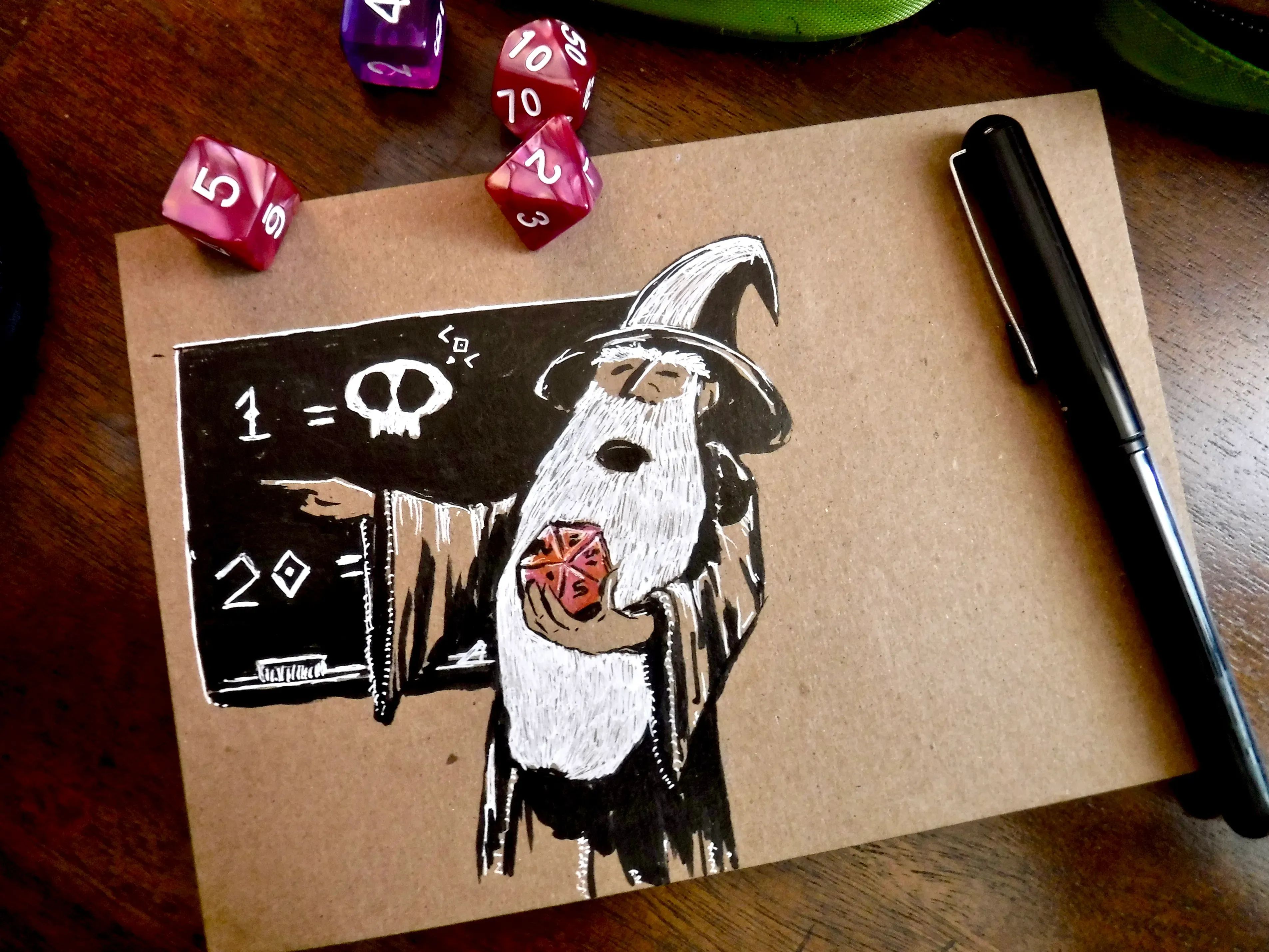 A whimsical ink and watercolor fantasy character drawing displayed with gaming dice